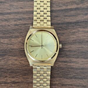 men’s nixon minimal watch.